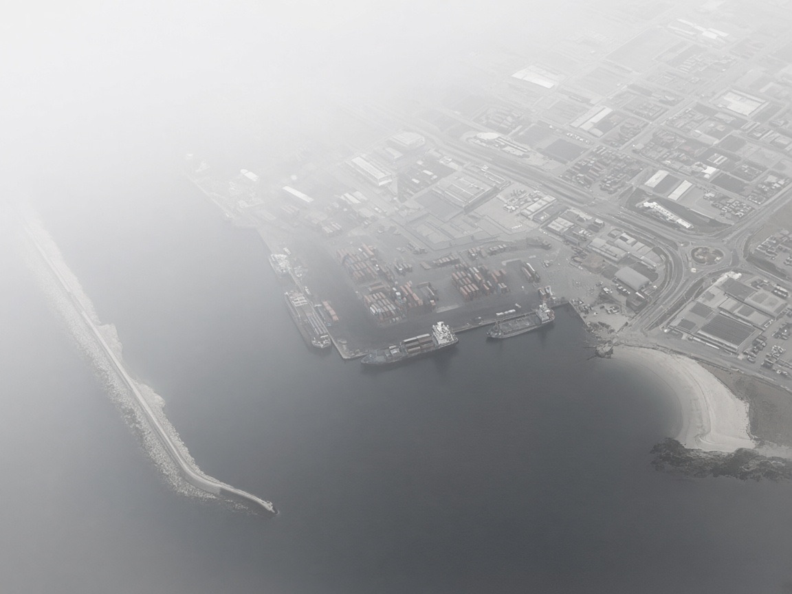 Aerial harbor obscured by haze