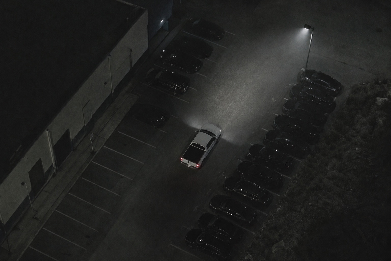 Aerial view of pickup truck in parking lot